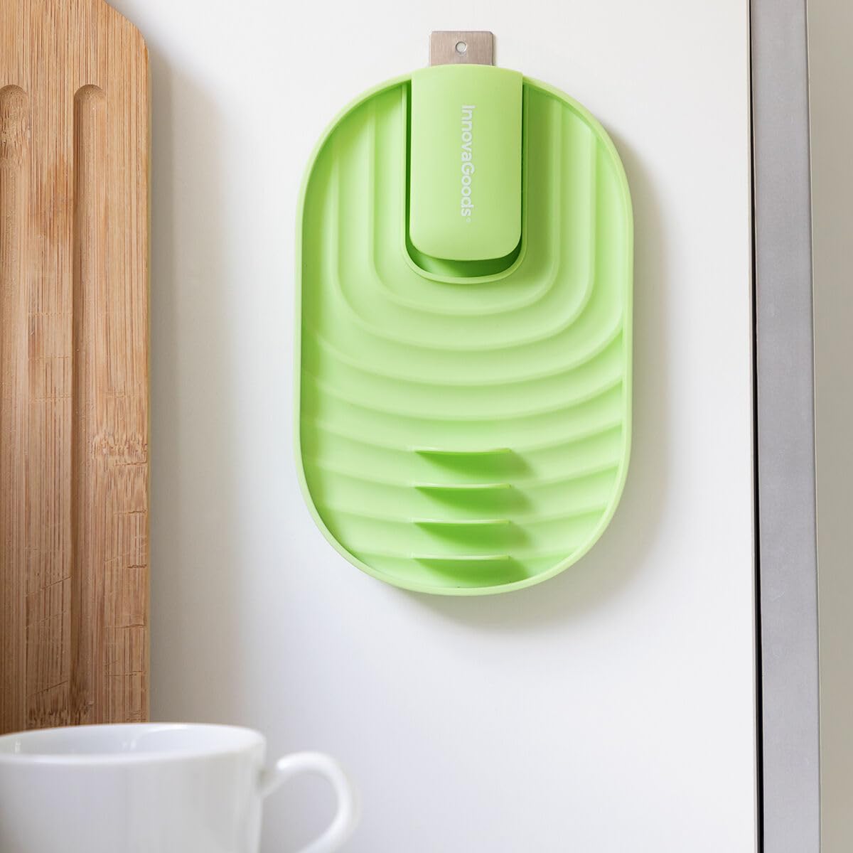 InnovaGoods® Multifunctional Kitchen Organizer, innovative and functional design, foldable lid holder, utensil fixing grooves, wide and stable base, easy storage.